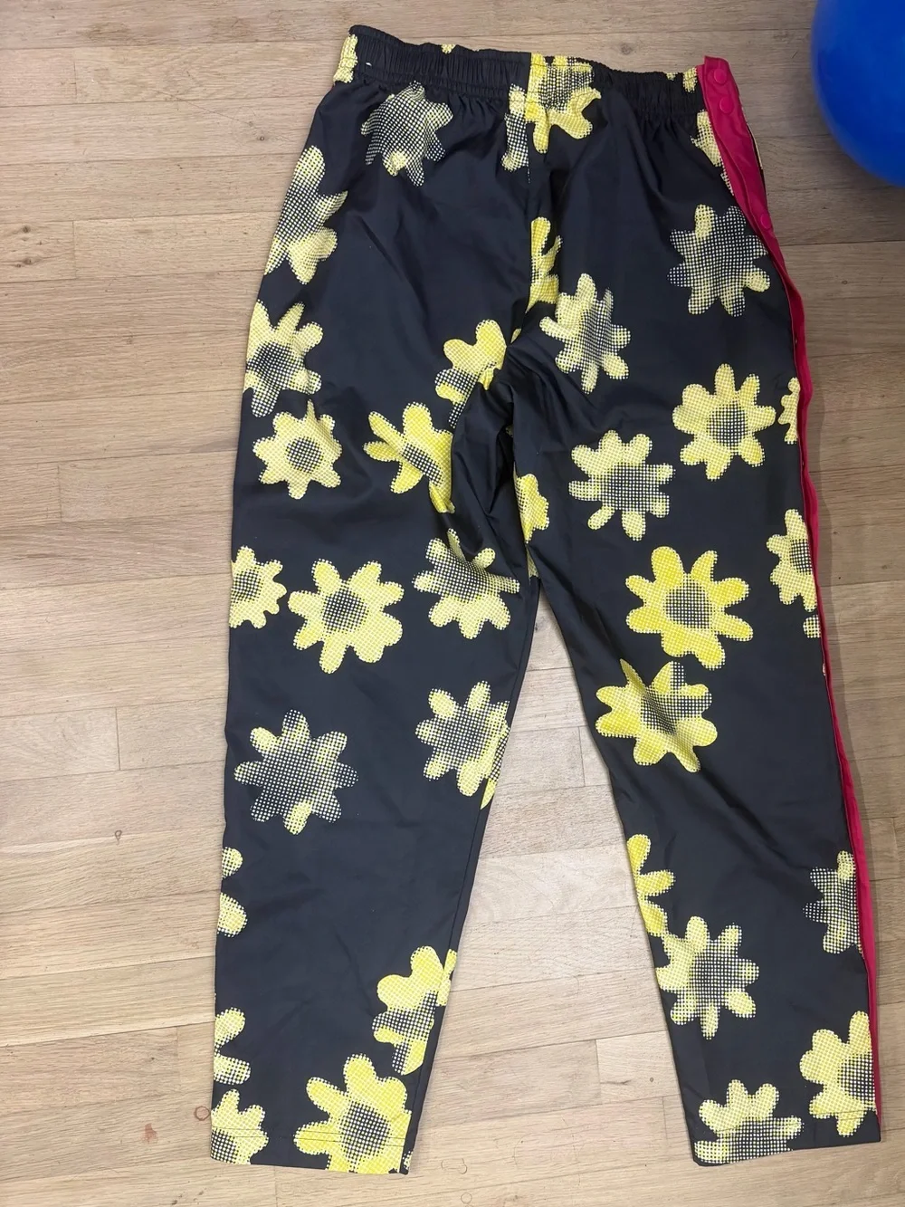 Nike Black Floral Track Pants with Yellow Print and Pink Side Stripe